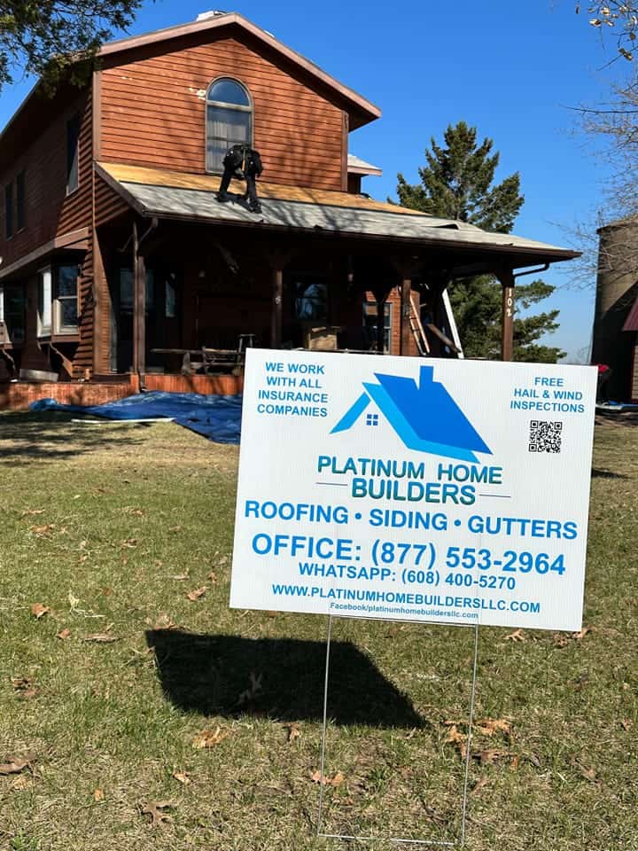 platinum home builders sign in front of house during construction. Skylights Dane County, WI